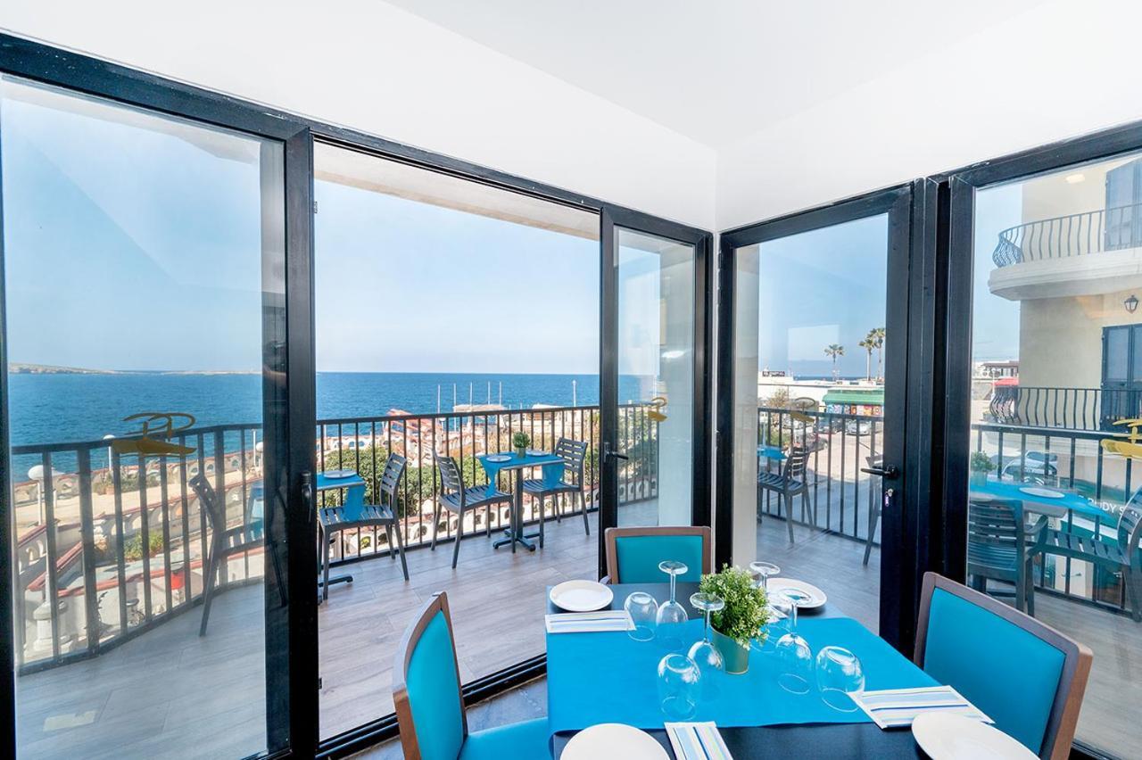 Islet Promenade Seafront Apartment With Large Corner Terrace By Getawaysmalta St. Paul's Bay Exterior foto